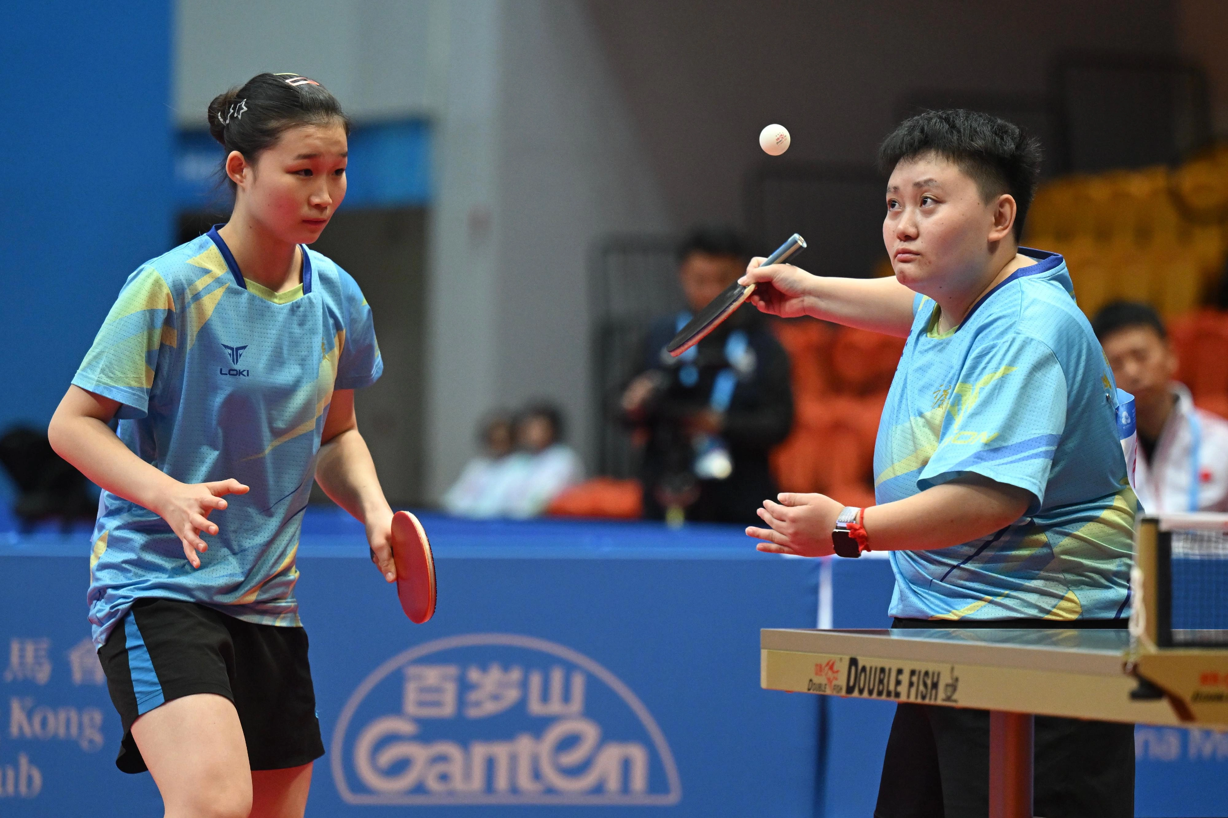 The Hong Kong Jockey Club Trophy para table tennis (TT11) competition of the 12th National Games for Persons with Disabilities and the 9th National Special Olympic Games was held on December 14 at Tsuen Wan Sports Centre. Photo shows athletes competing in the women's doubles event.