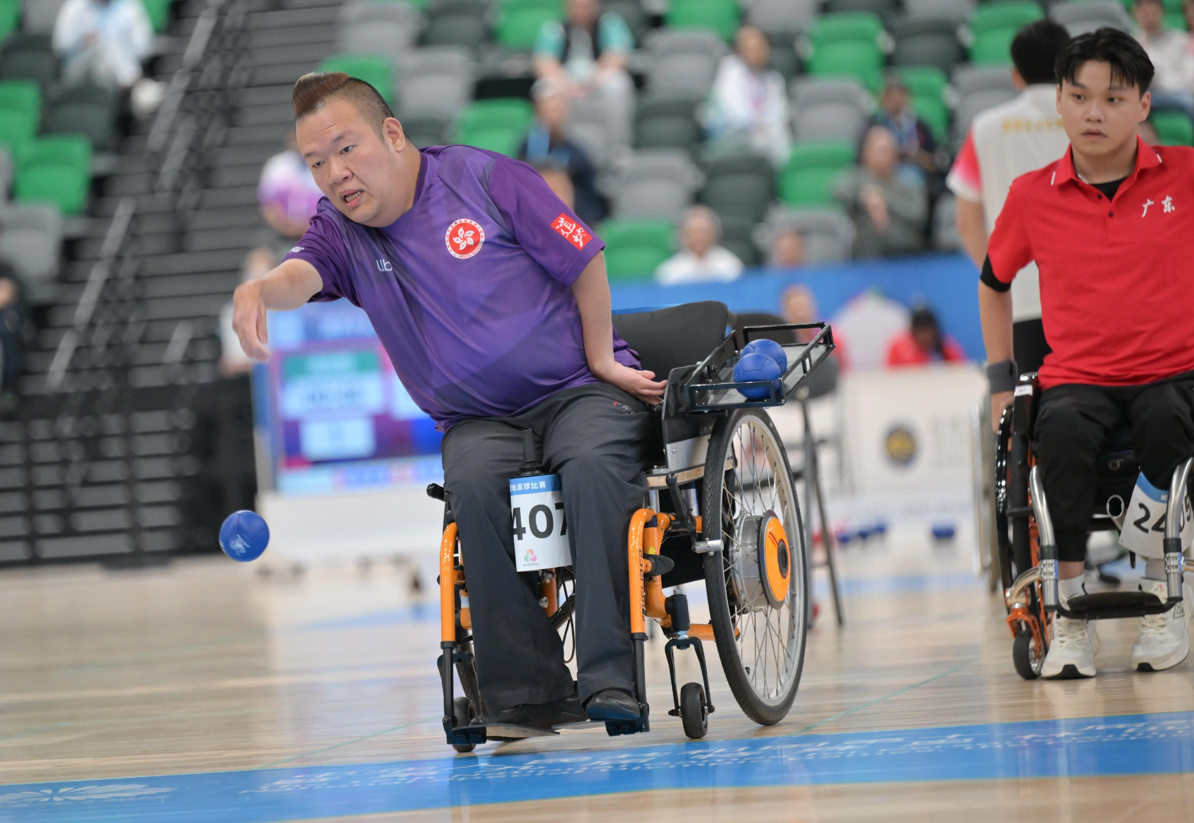 The individual finals of the boccia competition of the 12th National Games for Persons with Disabilities and the 9th National Special Olympic Games was held at Kai Tak Arena, Kai Tak Sports Park on December 12. Photo shows Hong Kong athlete Leung Yuk-wing competing in the Men's Individual BC4 event.