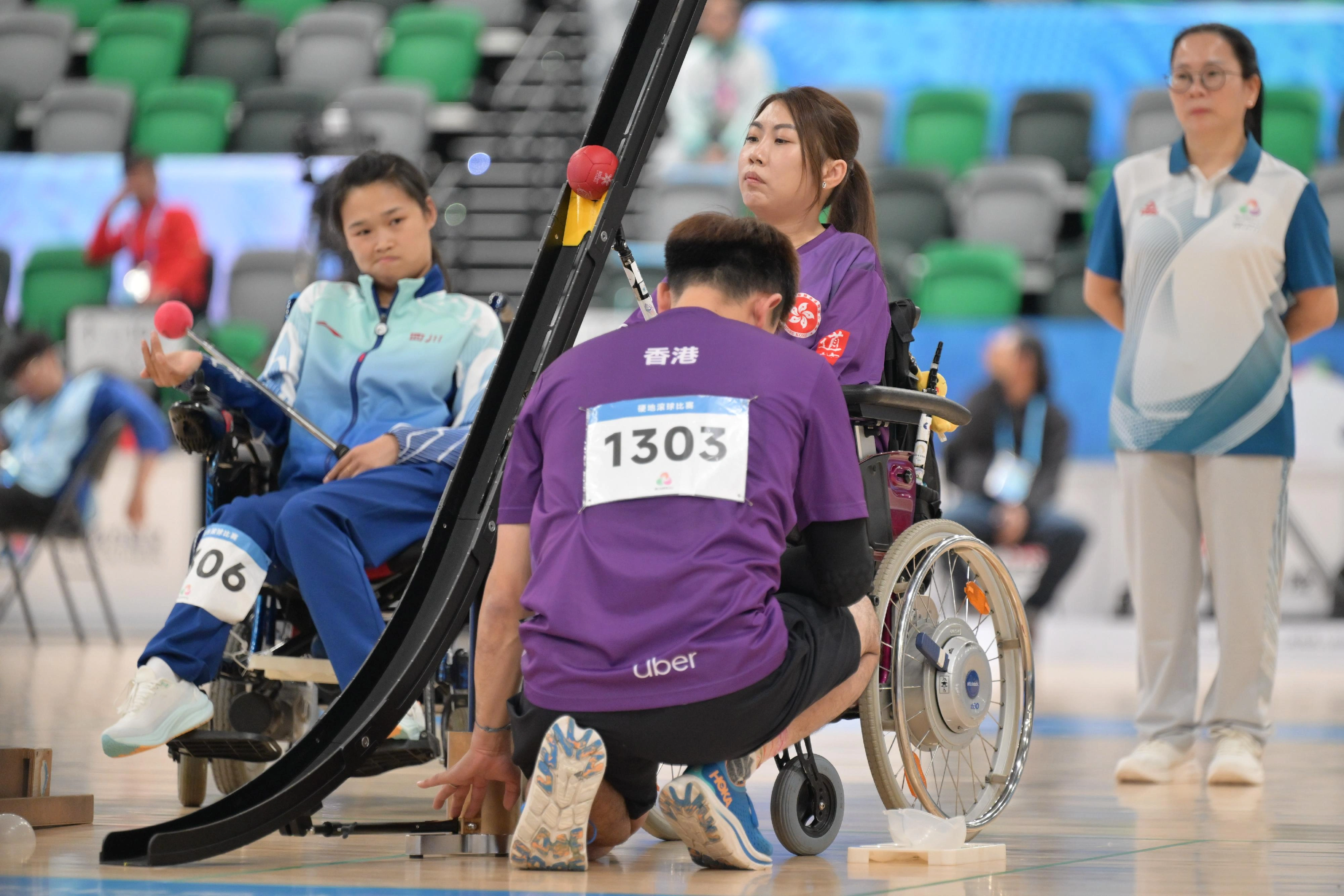 The individual finals of the boccia competition of the 12th National Games for Persons with Disabilities and the 9th National Special Olympic Games was held at Kai Tak Arena, Kai Tak Sports Park on December 12. Photo shows Hong Kong athlete Ho Yuen-kei competing in the Women's Individual BC3 event.
