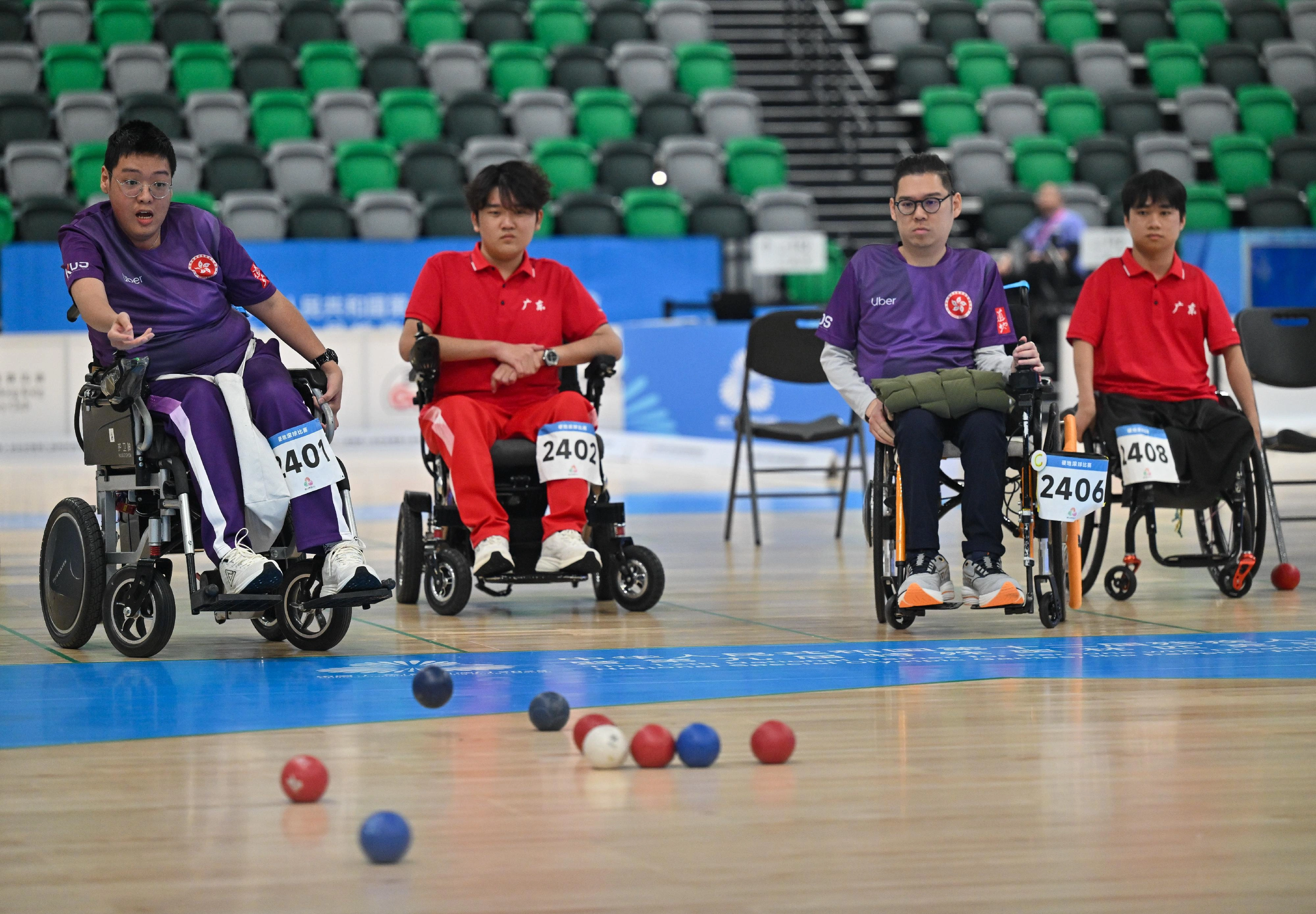 The double and group finals of the boccia competition of the 12th National Games for Persons with Disabilities and the 9th National Special Olympic Games was held at Kai Tak Arena, Kai Tak Sports Park on December 14. Photo shows Hong Kong athletes competing at the Men's Double BC4 event.