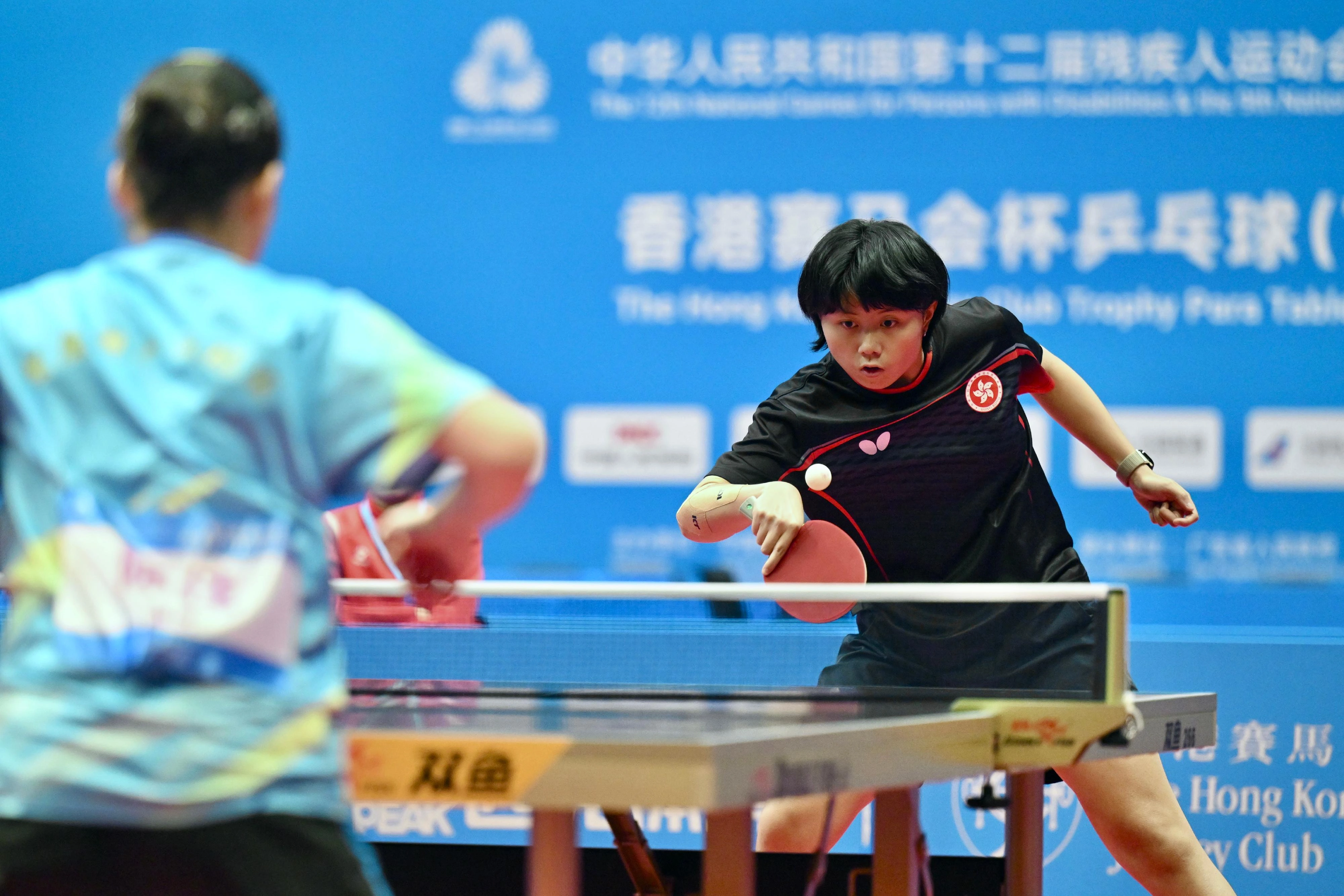 The Hong Kong Jockey Club Trophy para table tennis (TT11) competition of the 12th National Games for Persons with Disabilities and the 9th National Special Olympic Games was held on December 14 at Tsuen Wan Sports Centre. Photo shows athletes competing in the women's singles event.