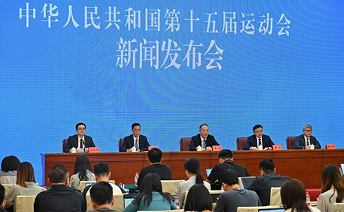 Group of Chinese government gathered together for press release on the national games